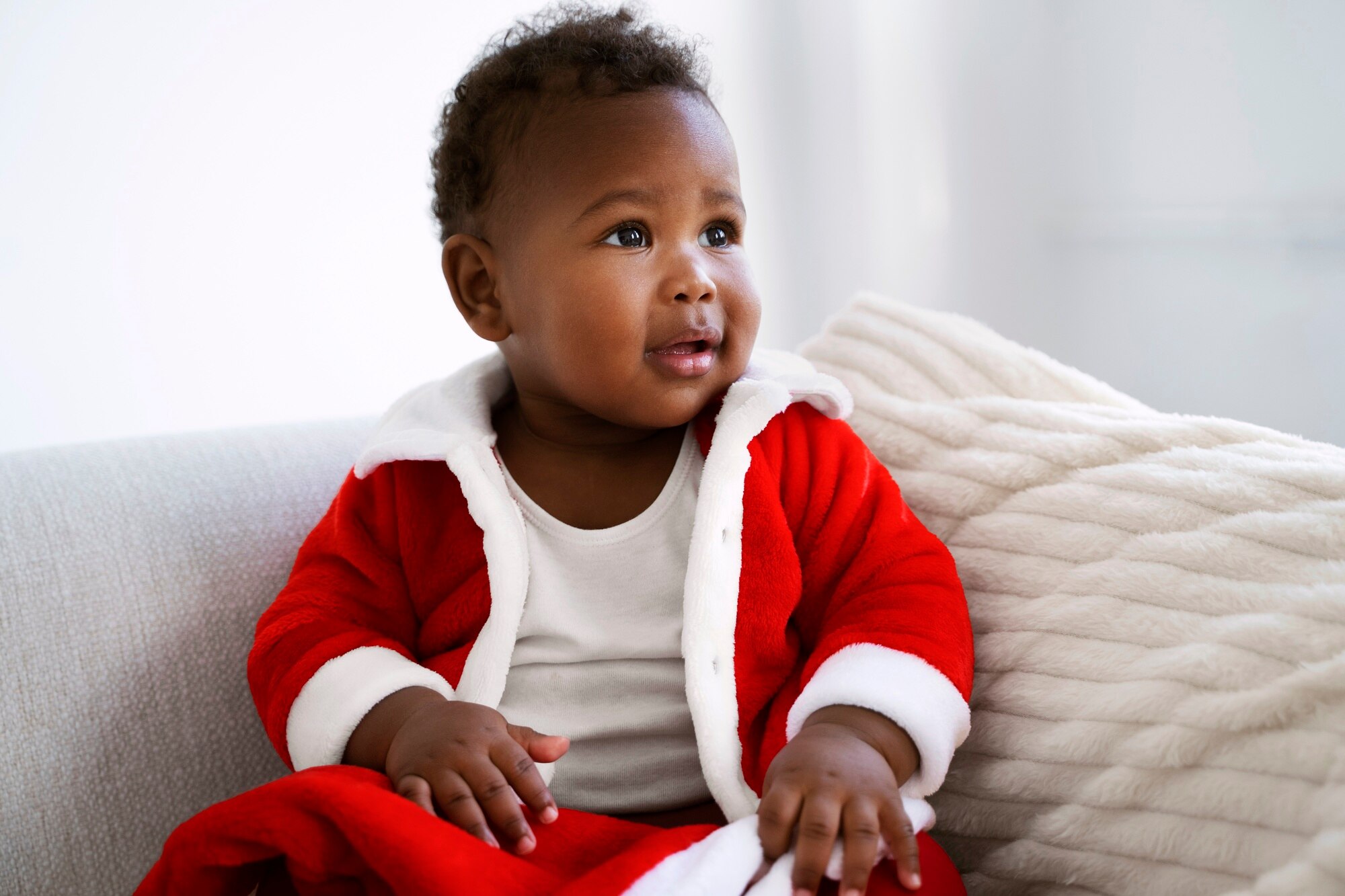 Baby-wearing-santa-outfit-medium-shot 23-2149829680 - Youth Village 