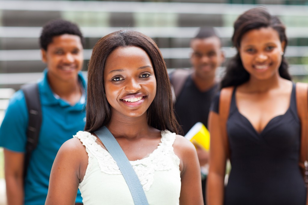 group of african college students on modern campus