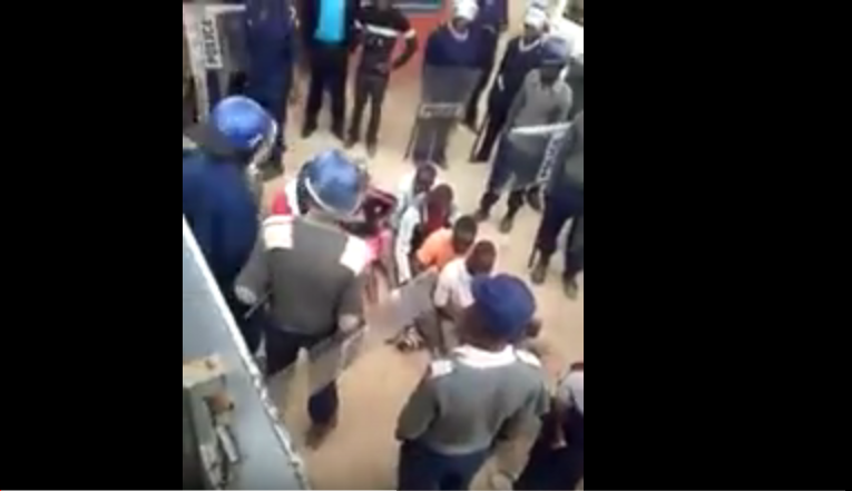 Watch Police Brutalize A Woman In Front Of Kids